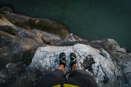 united states person taking picture on the high ground grey